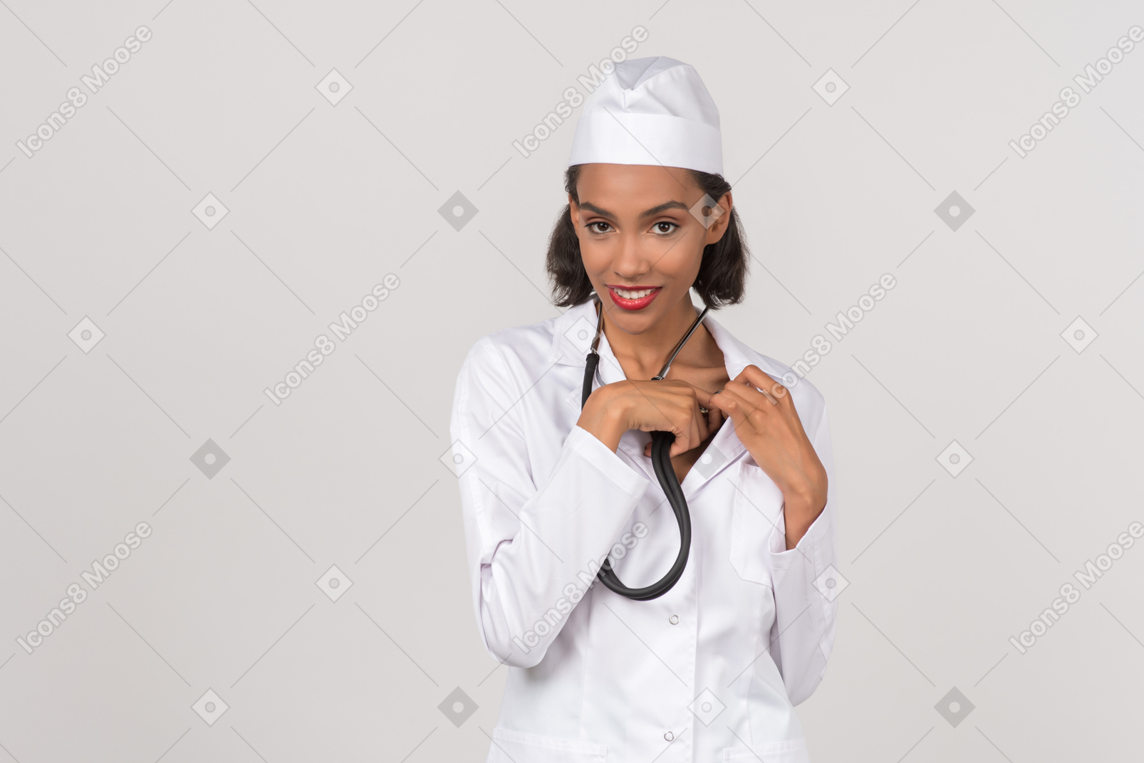 Attractive female doctor making a self check with a stethoscope