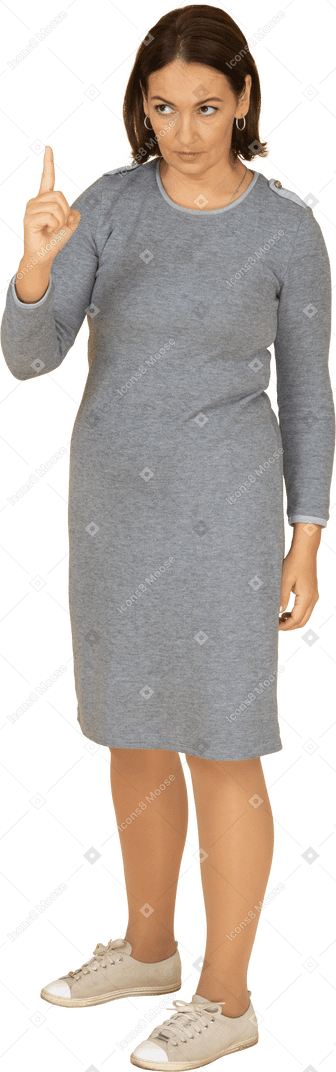 指で上向き灰色のドレスを着た女性の正面図