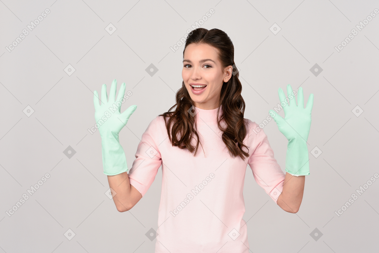 Attractive young woman pleased with her cleaning gloves