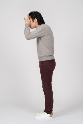 Man in casual clothes posing