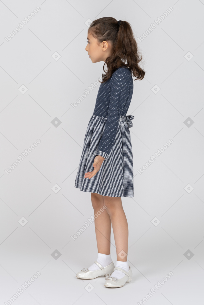 Side view of a girl gesturing in exasperation expectantly