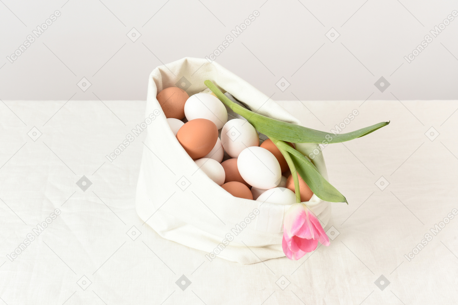Chicken eggs and a tulip