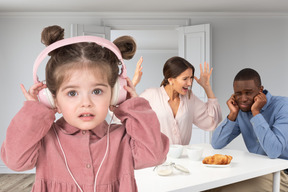 Parents quarrelling in front of their distressed daughter