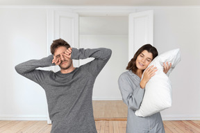 Sleepy young couple in the morning