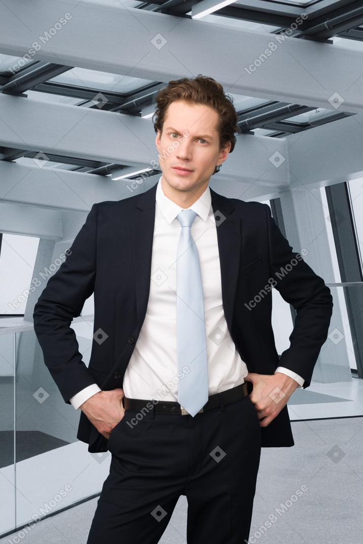 Businessman standing in front of a piano