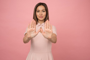 Girl holding her arms elongated