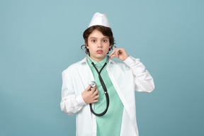 Attractive teenage in a doctor's outfit