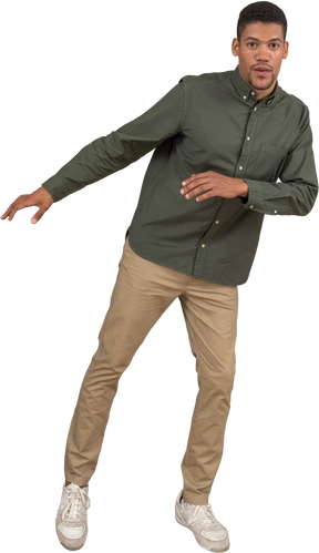 Front view of a man  fumbling and leaning to the side