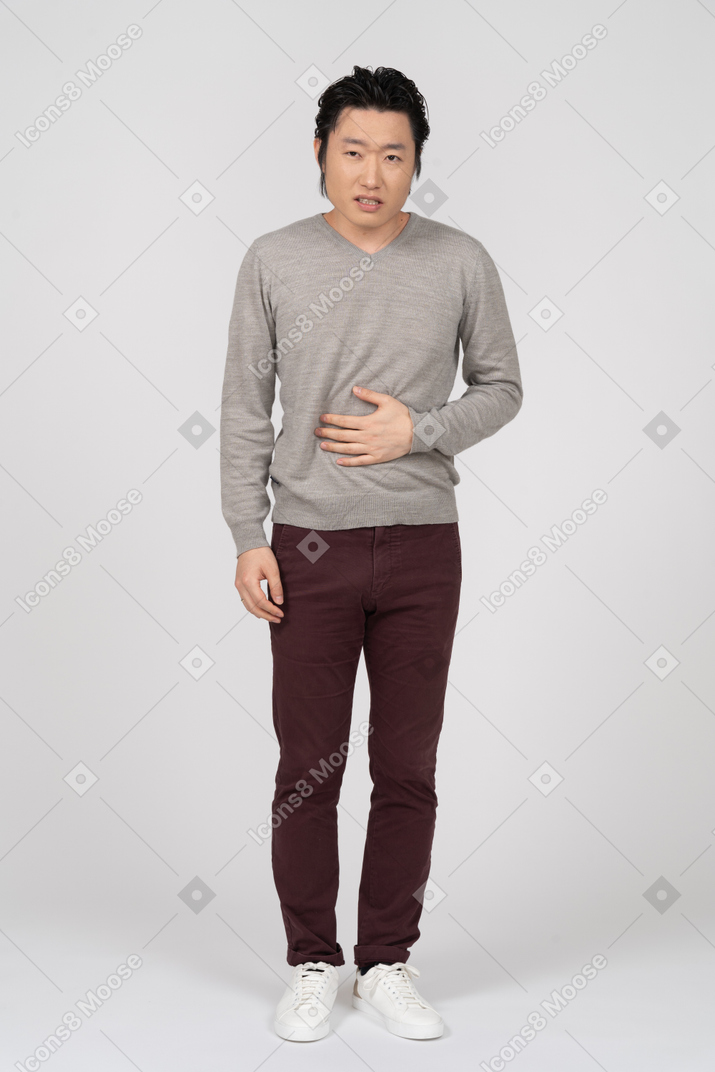 Man in casual clothes posing