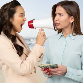 Woman shouting through a megaphone