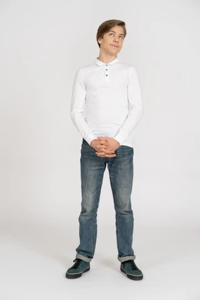 Young man in casual clothes standing