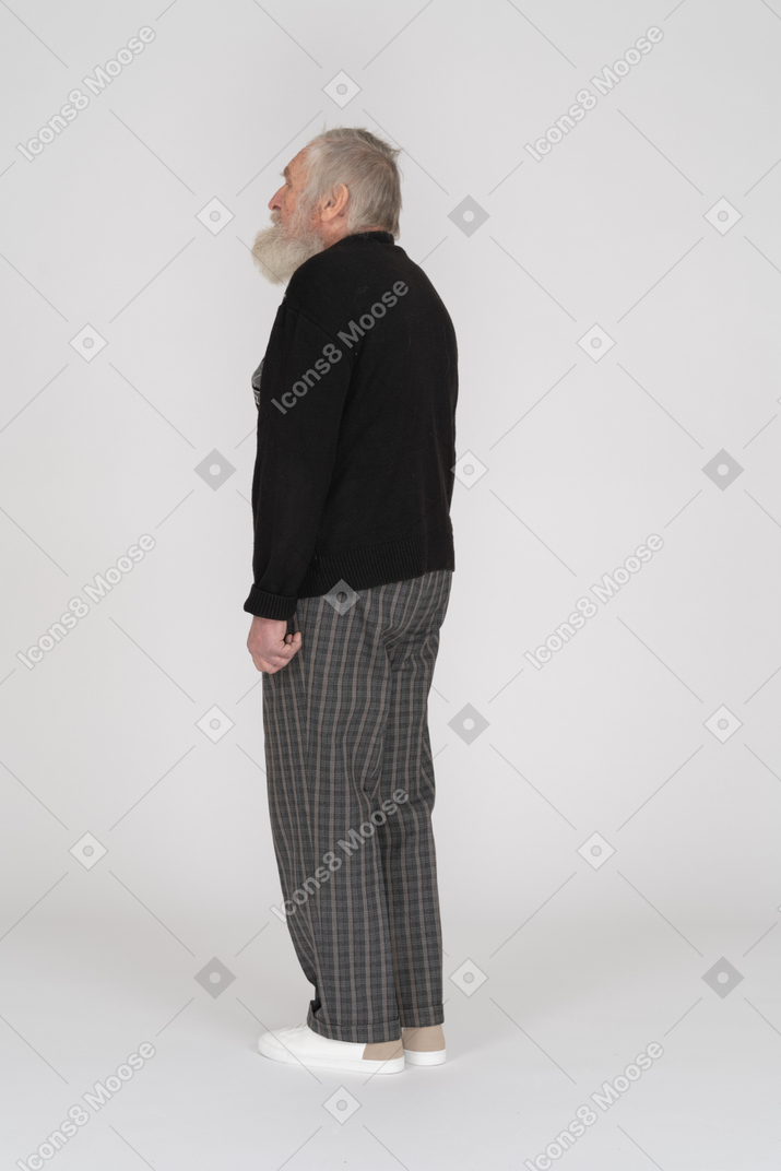 Three quarter back view of an old man
