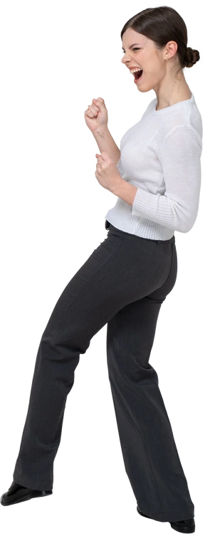 Three-quarter back view of a delighted young woman in office clothing