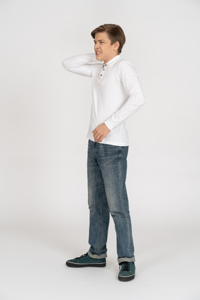 Young man in casual clothes standing