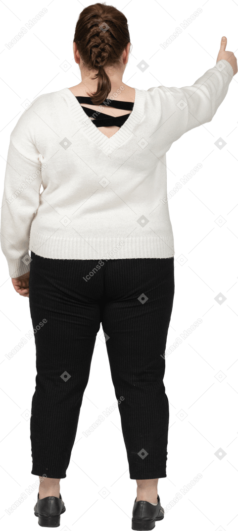 Plump woman in white sweater showing thumb up