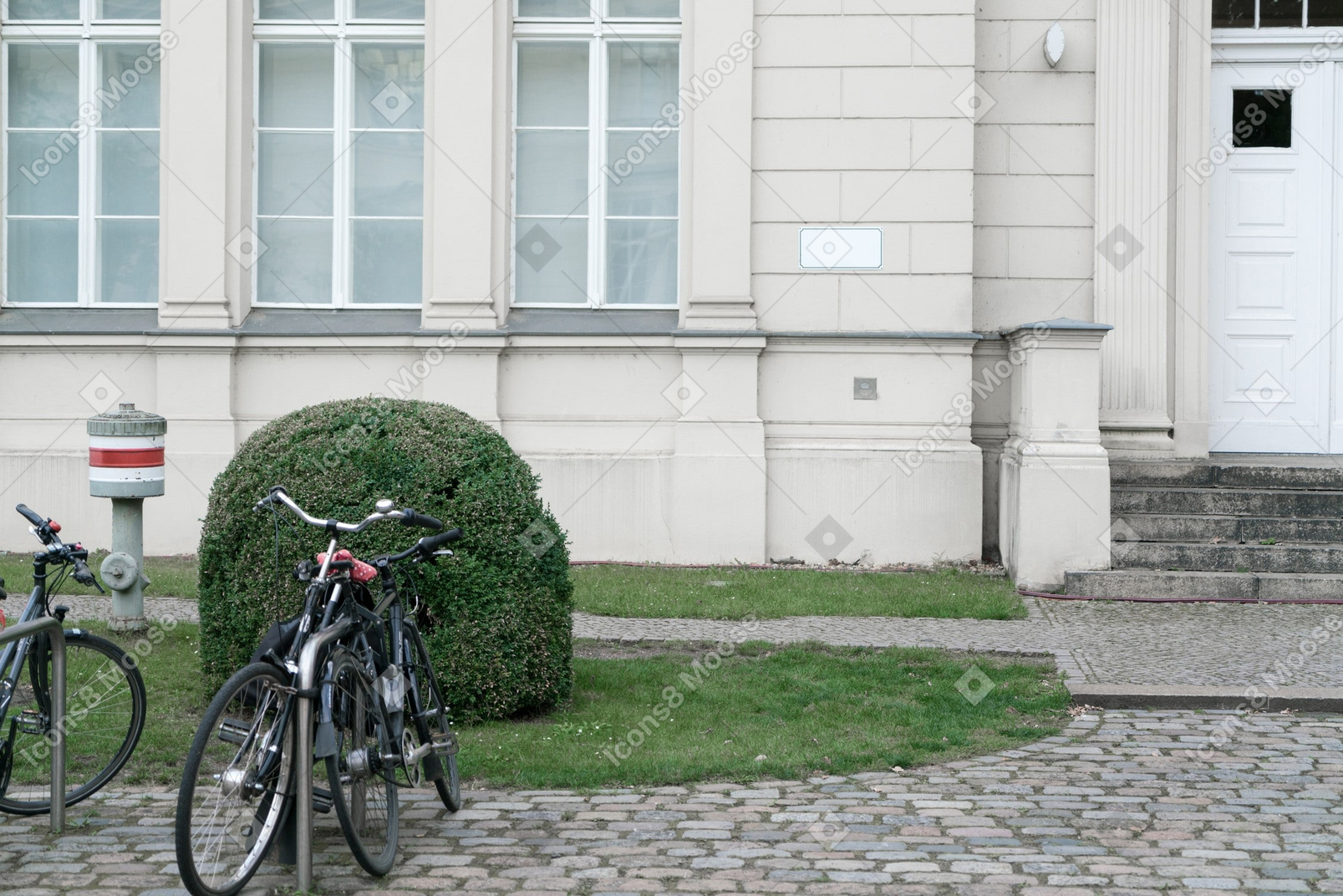 Bicycle leaning against a wall