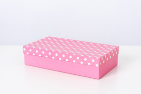 Pink gift box on a white background