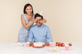 Young asian woman closing eyes to his partner