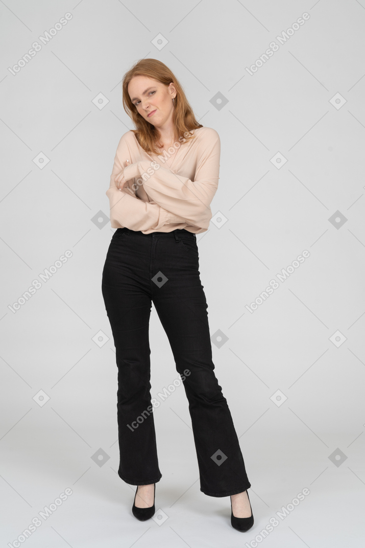 Woman in beautiful blouse standing