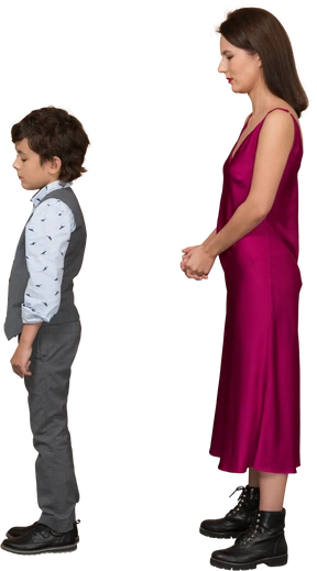 Young woman in red dress and boy standing still