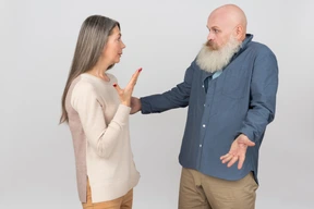 Elegant senior couple standing together