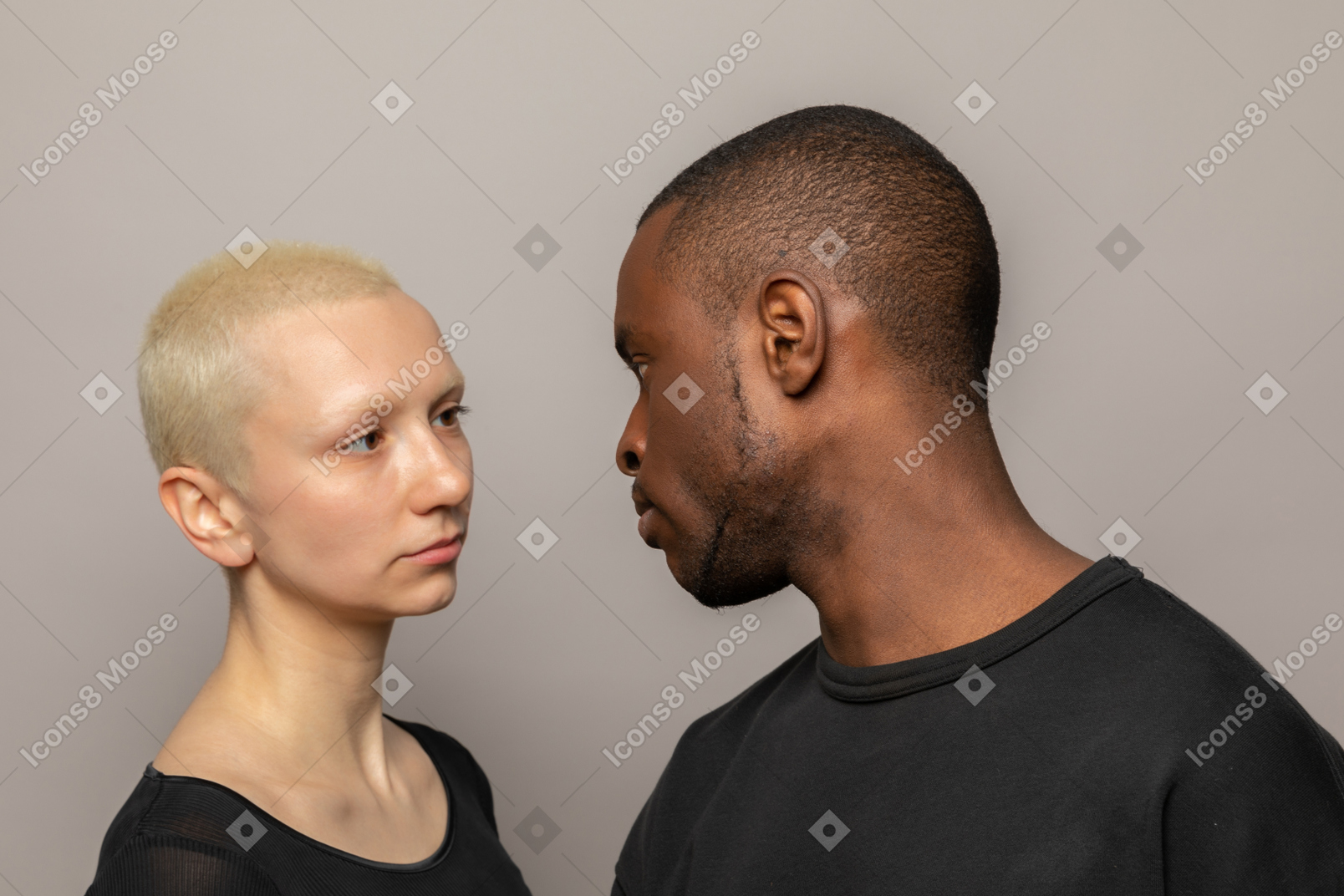Mad young man looking at woman