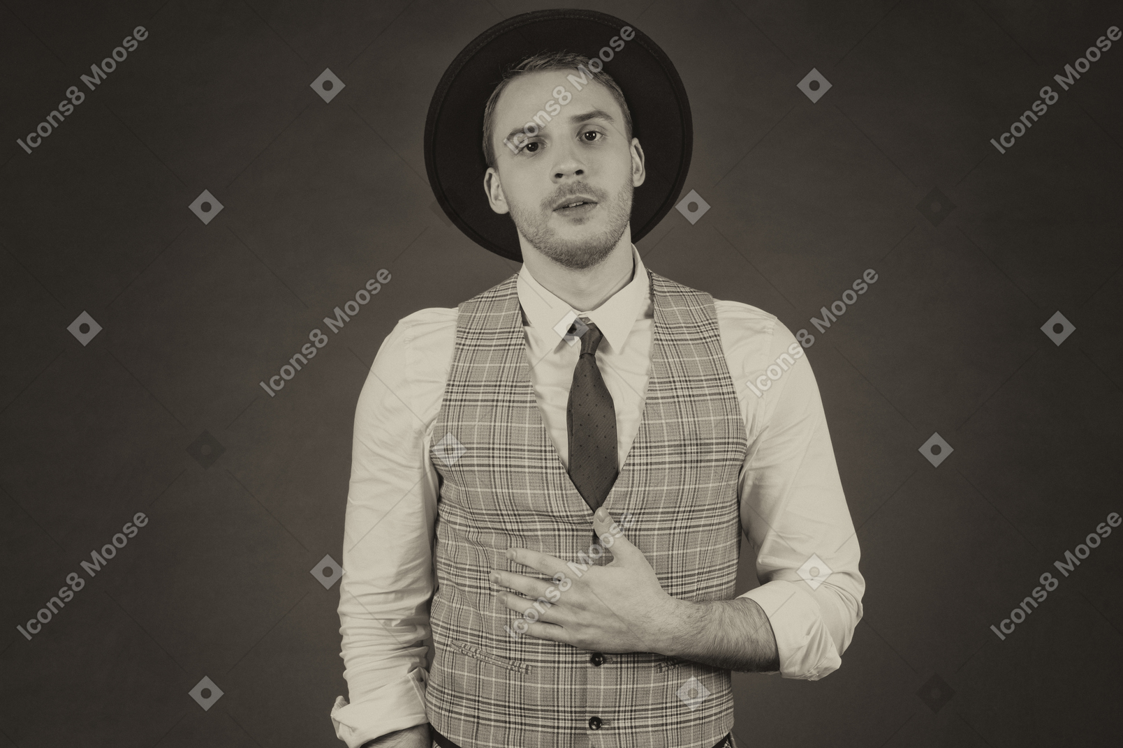 Black and white portrait of a handsome gentleman in hat