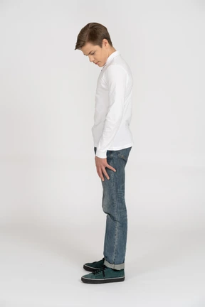 Young man in casual clothes standing