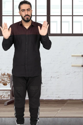 Man showing a stop gesture