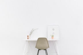 White table and chair in white room