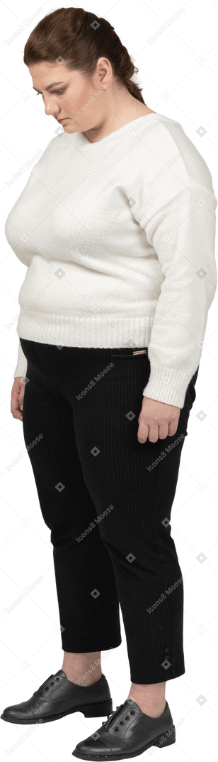 Plump woman in casual clothes standing