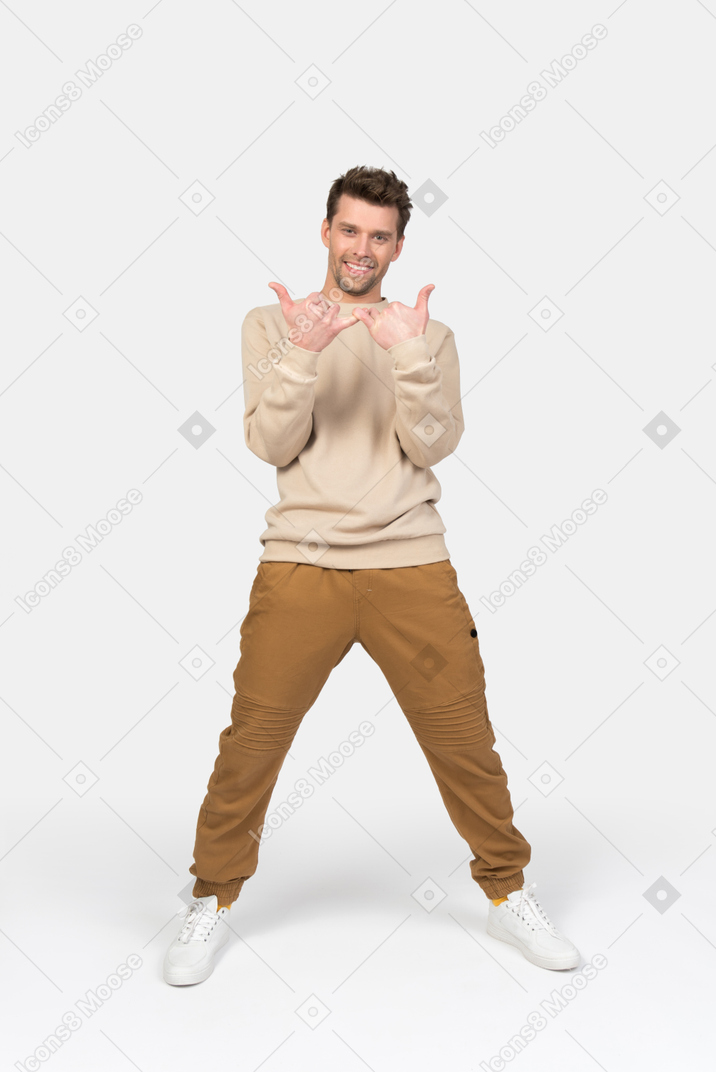 Young guy making a shaka gesture