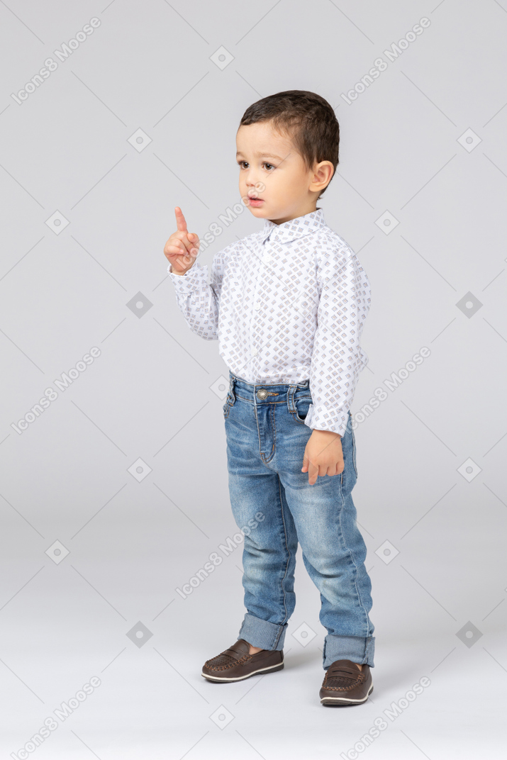 Little boy showing his finger