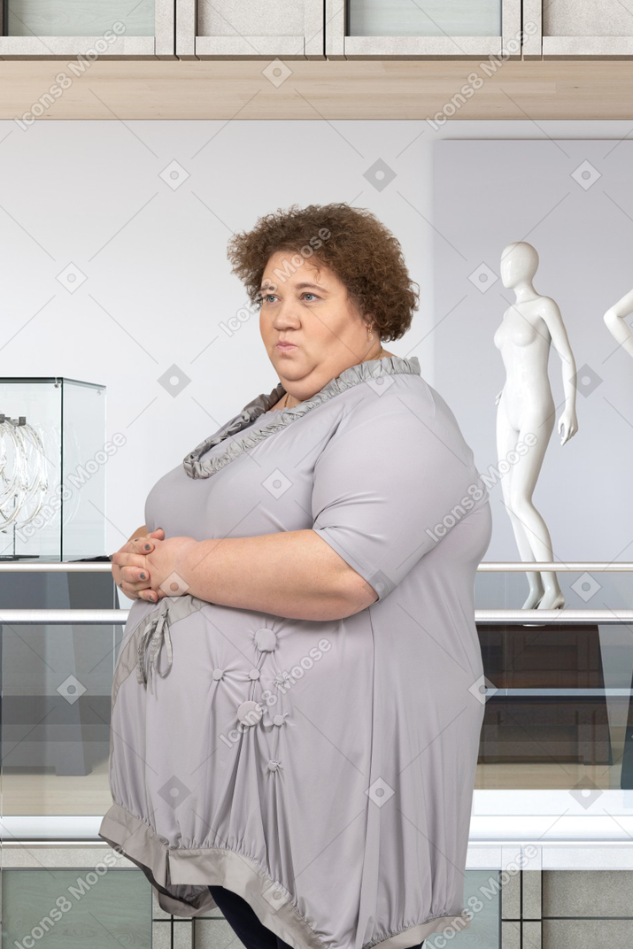 Woman walking around a museum