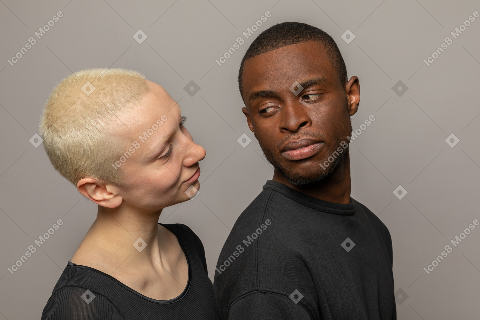Young international couple looking at each other