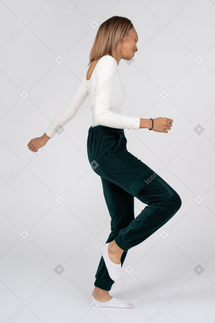 Woman in casual clothes walking