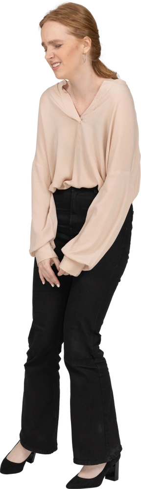 Woman in beautiful blouse standing