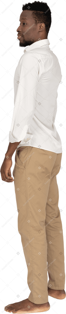 Man in white shirt standing