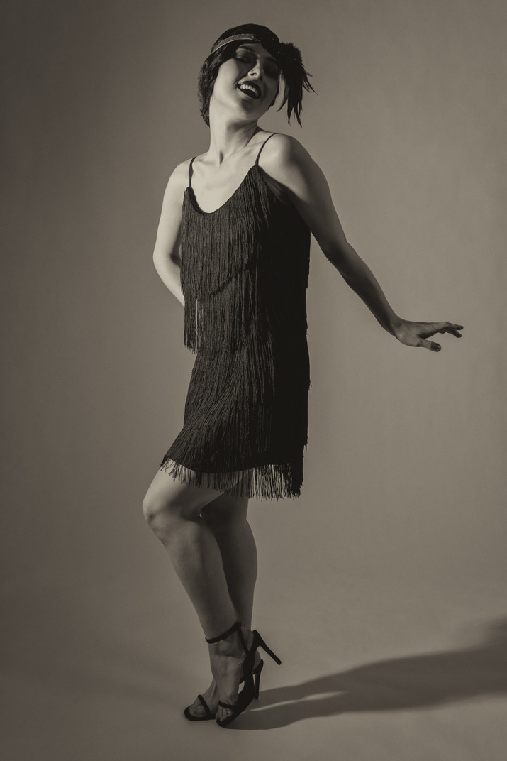 Full length black and white photo of an american flapper