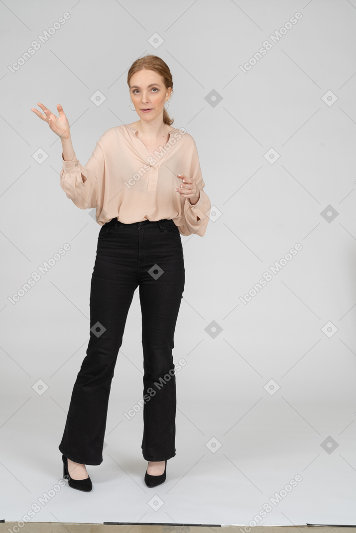 Woman in beautiful blouse standing