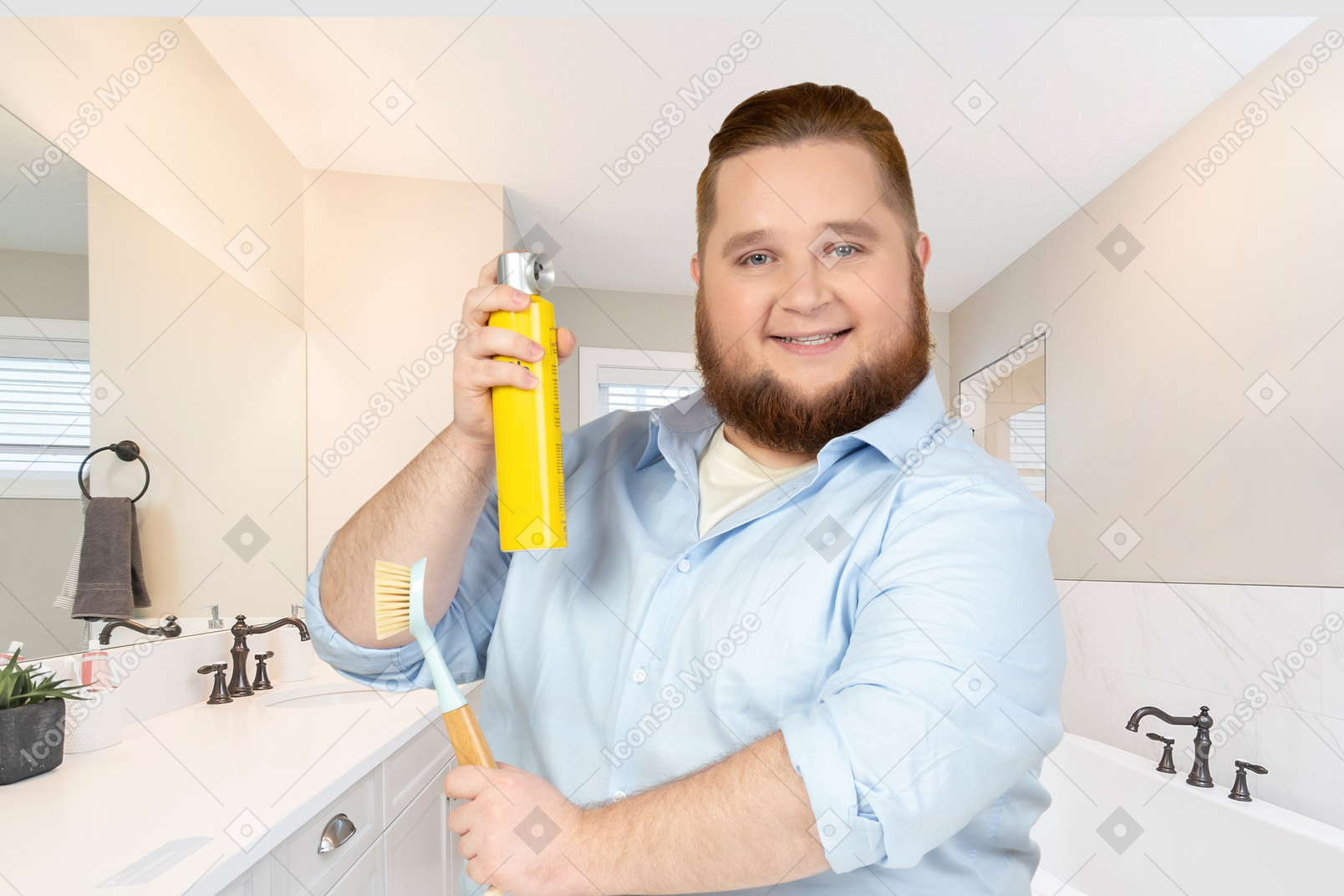 A man holding cleaner spray and brush in the bathroom 
