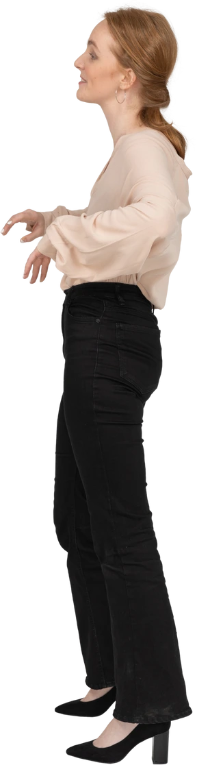 Woman in beautiful blouse standing