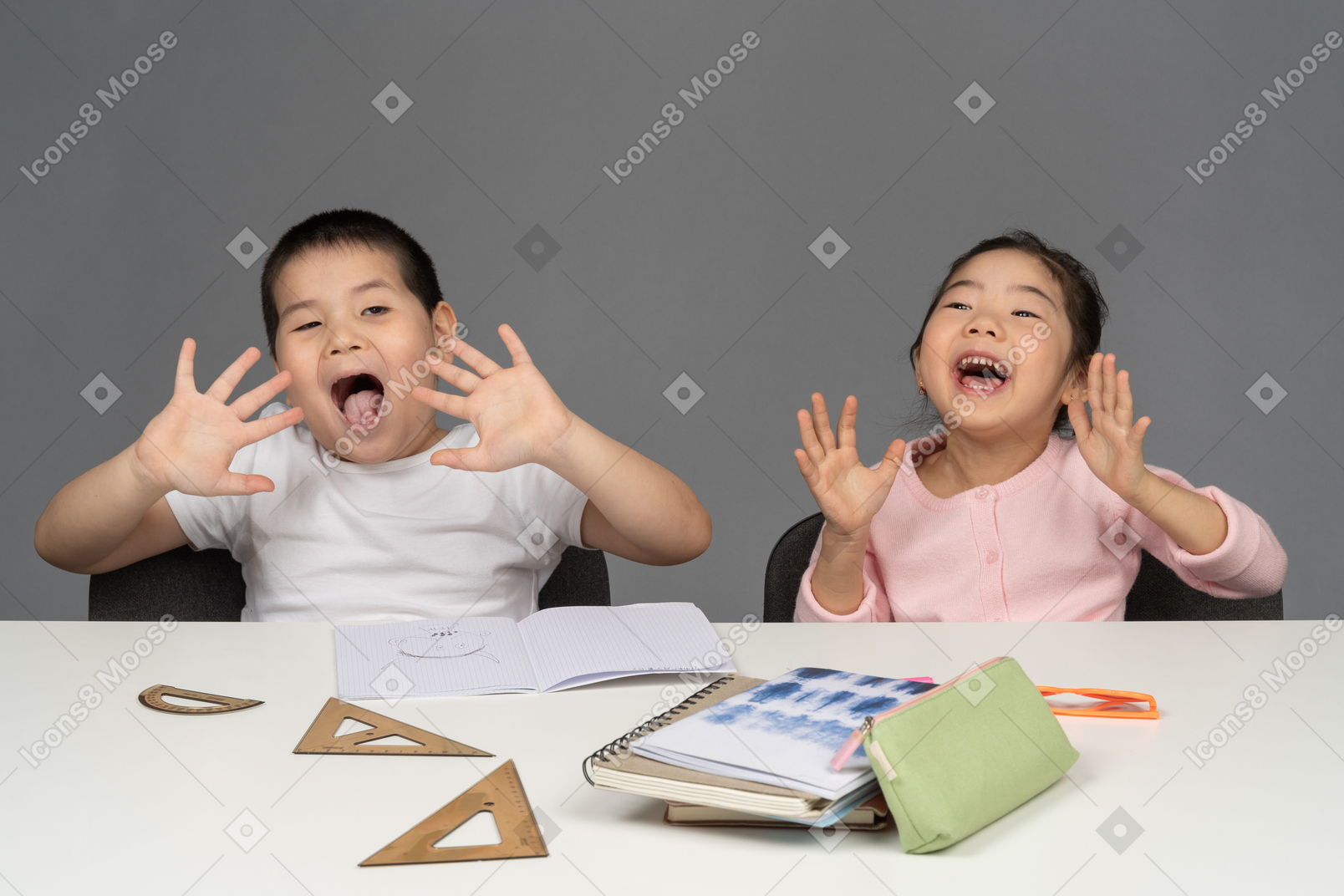 Schoolkids making funny faces