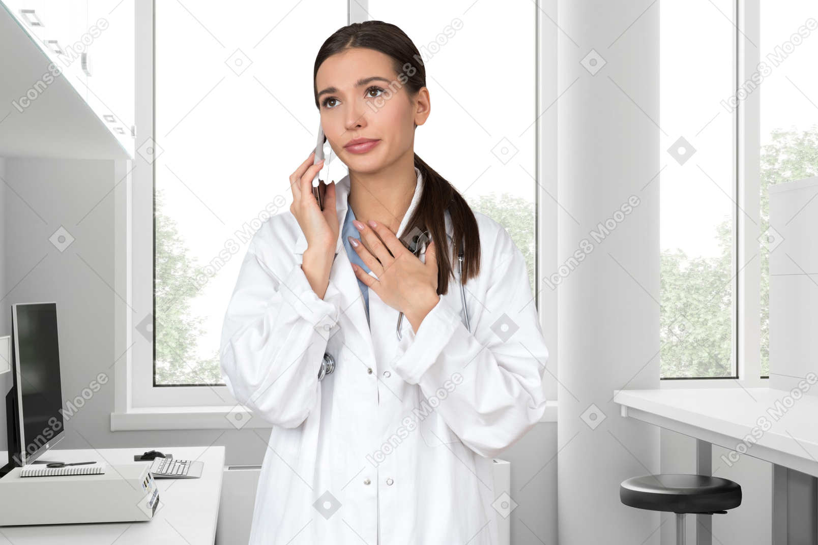 Sad woman doctor talking on the phone