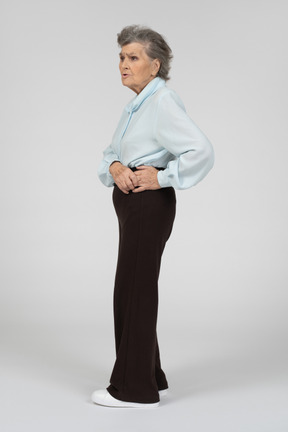 Side view of an old woman looking disgruntled