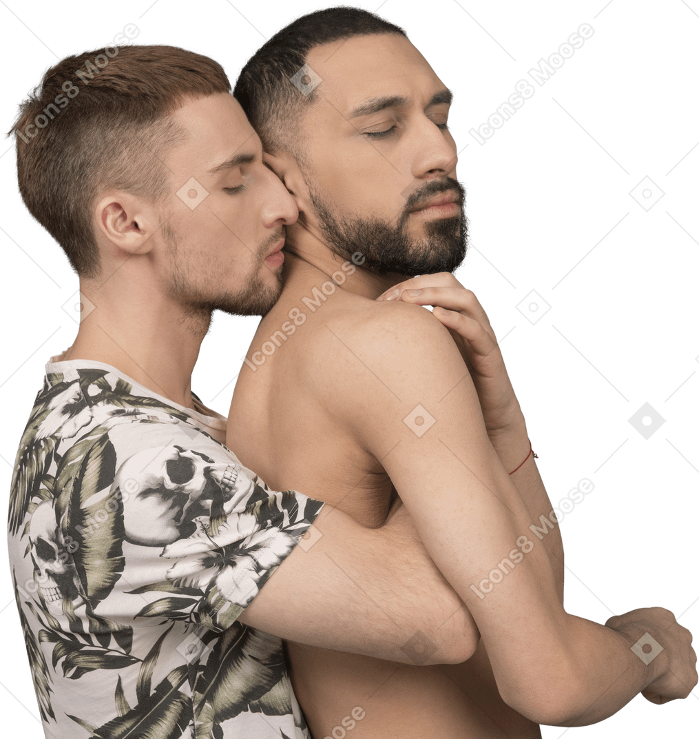 Side view of a man hugging his boyfriend from behind