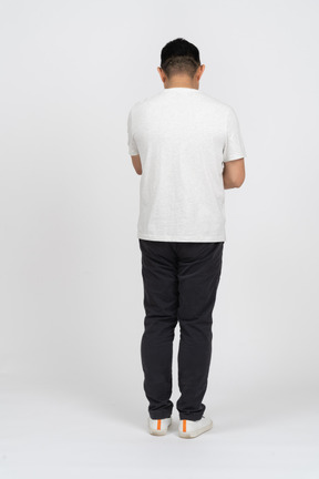 Rear view of a man in casual clothes