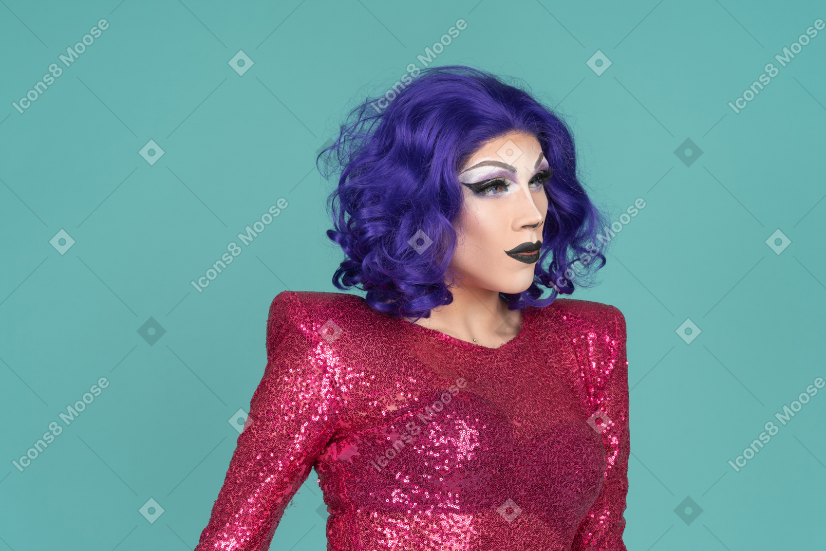 Three-quarter view of a drag queen looking aside