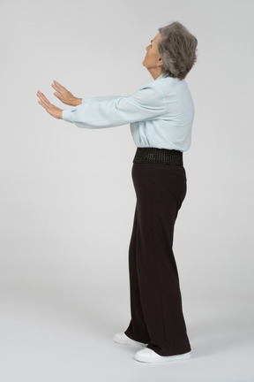 Old lady giving stop gesture