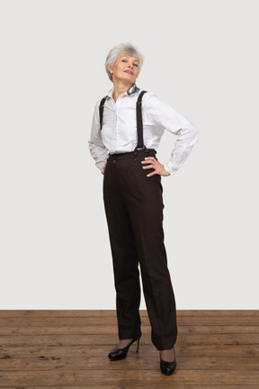 Businesswoman posing with her hands on hips